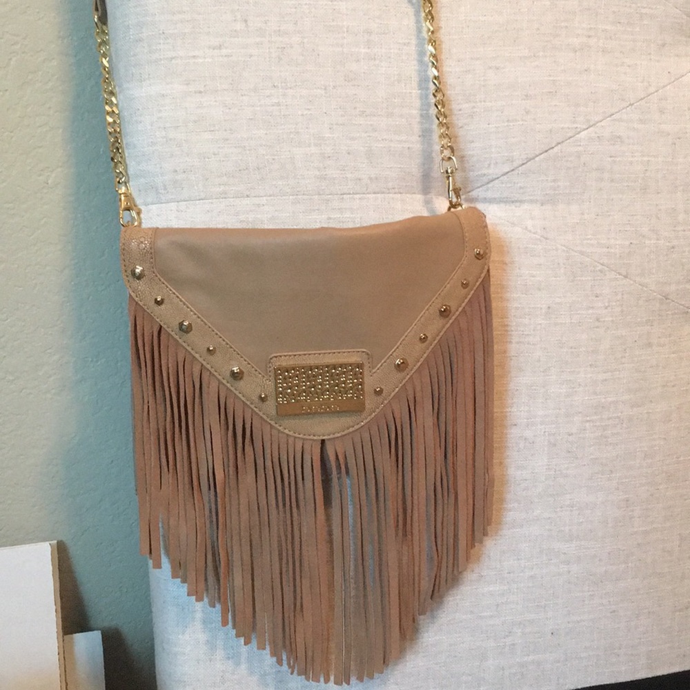 Bebe crossbody bag with detachable strap. NWOT